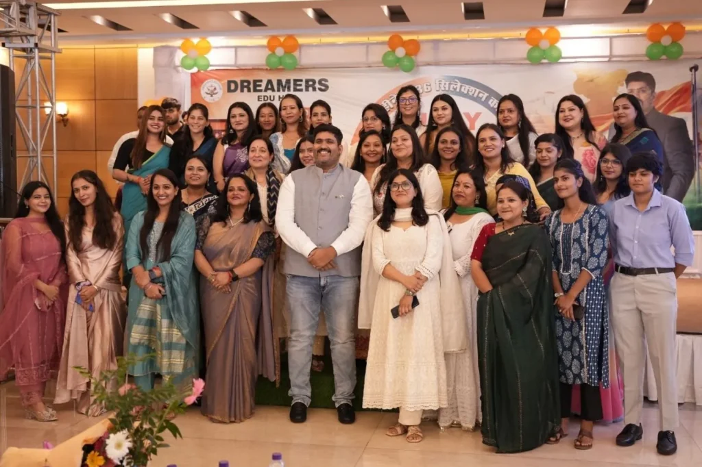 Female faculty members alongside Hariom Chaudhary